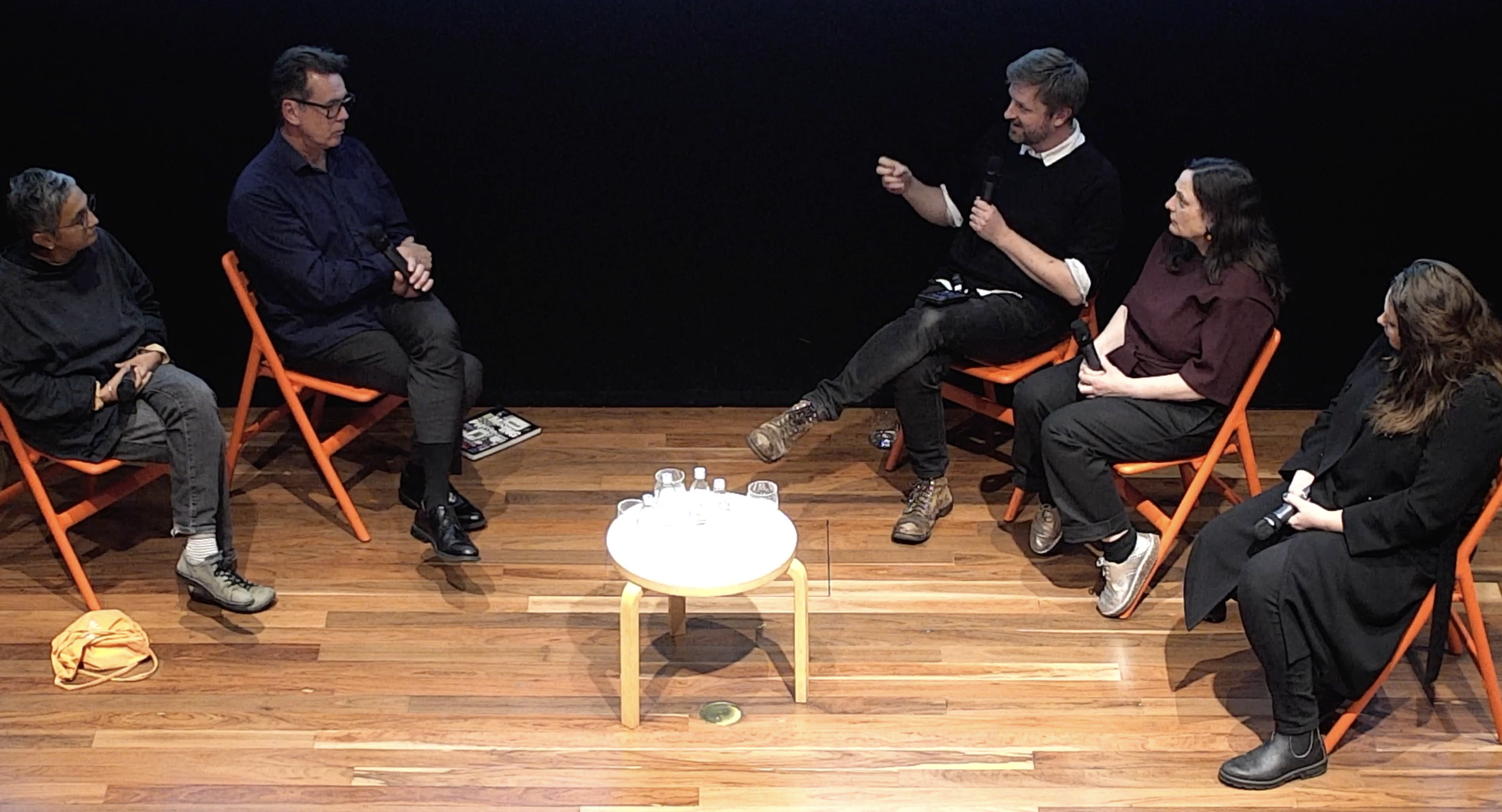 A photograph of the panel conversation in progress