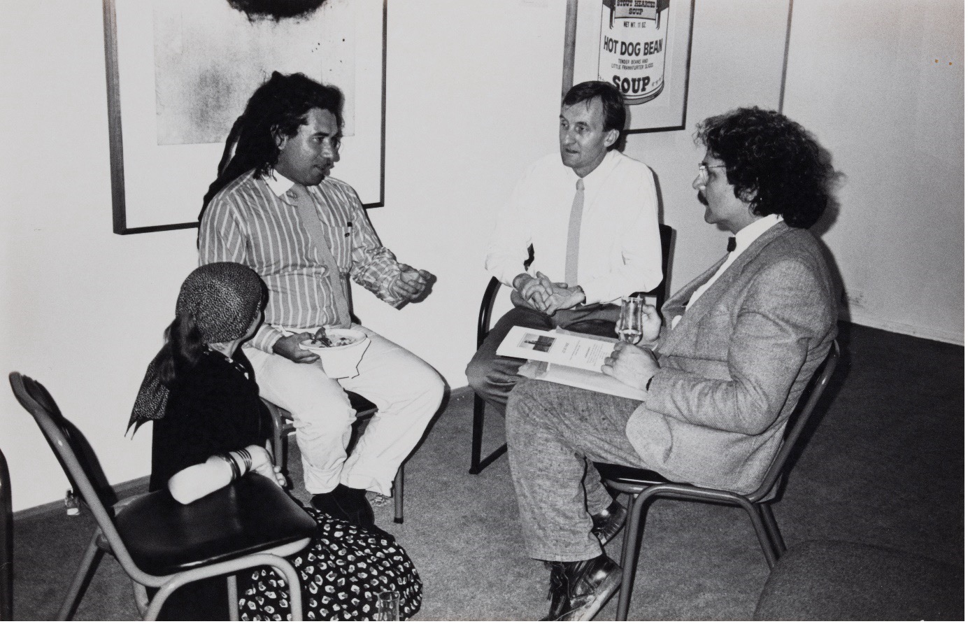 A photograph of Bernice Murphy, Djon Mundine, Leon Paroissien and George Miller in the Power Gallery of Contemporary Art.