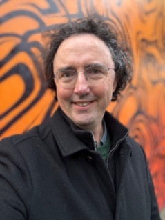 A photograph of Chris Chesher